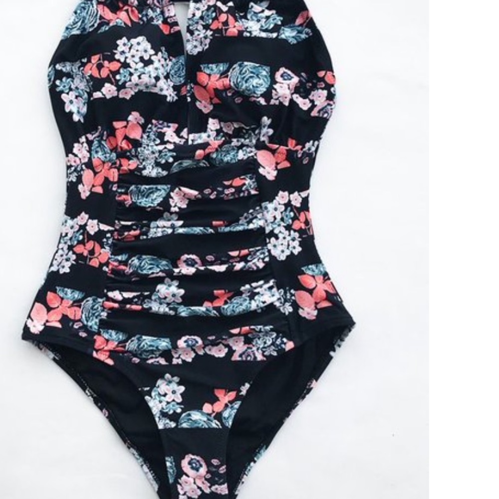 Floral one-piece halter swim suit. XL never worn.